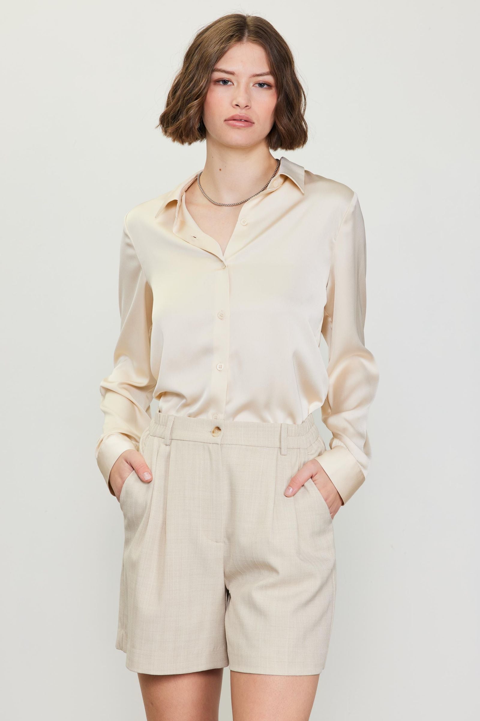 Skies Are Blue Beige Melange Pleated Shorts